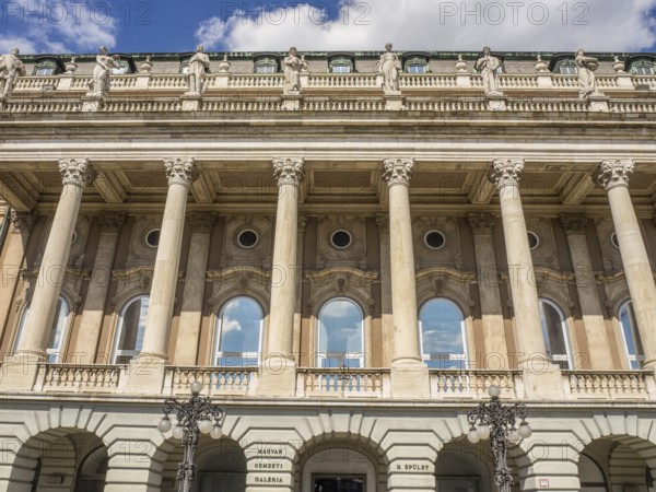 A classic façade with high columns and several windows symbolises monumental architecture, budapest, danube, hungary