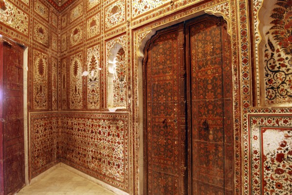 Painting on wall and wooden door in gallery of Gajraj Mahal in Junagarh fort, Bikaner, Rajasthan, India