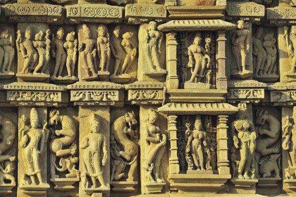 Intricately carved wall of parsvanatha temple Khajuraho madhya pradesh india