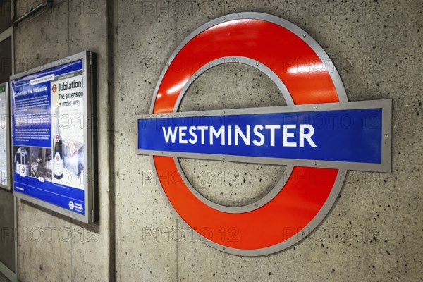 Westminster station roundel in the London Underground, showcasing classic subway design and British transport heritage