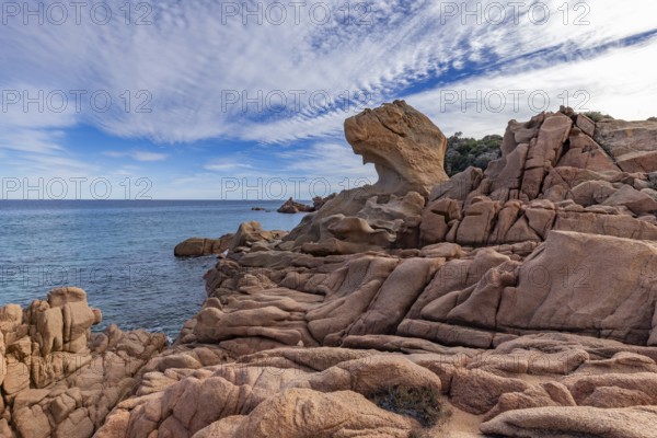 Coastal landscape with bizarre red rocks and sea view, Spiaggia di Cala E'Luas, Ogliastra, Sardinia, Italy