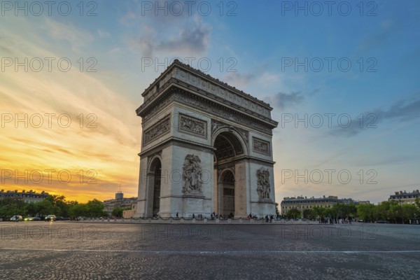 Paris France, city skyline sunset at Arc de Triomphe and Champs Elysees