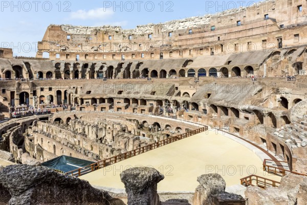 Rome, Italy - June 19, 2018: Roman Coliseum, The Eternal City of Rome. The historic architecture of the city of Rome, antique statues and buildings