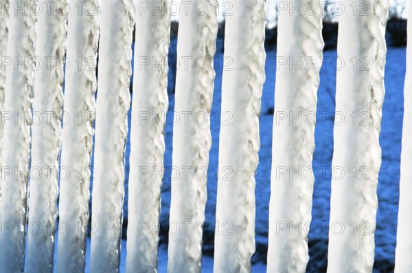 Huge icicles, icing on the sea pier