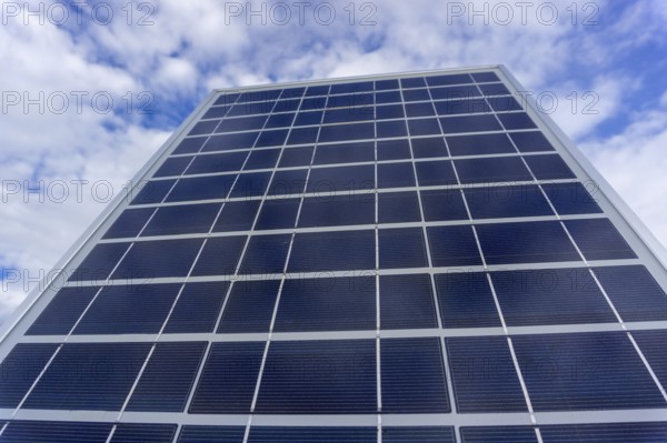 Solar panel in sunlight on sky background