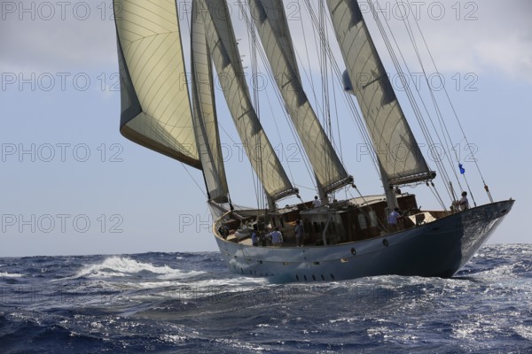 90-year-old sailing yacht Three-masted topsail schooner XARIFA sails during Monaco Classic Week. The 50-metre-long ship was built in 1927 by the British shipyard Samuel White for the sewing machine manufacturer Singer