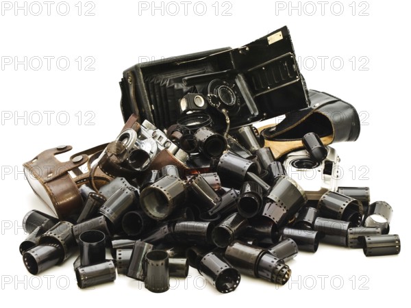 Retro Photo Accessory With Many Films And Vintage Cameras Against The White Background Daugavpils, Latvia