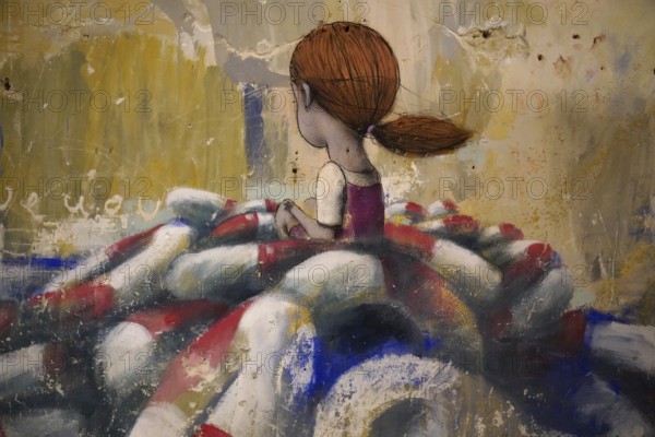 MAUSA VAUBAN, Museum of Urban Art and Street Art, Neuf-Brisach Fortress, France, Europe, Rear view of a girl with auburn hair in an artistic painting surrounded by pastel colours
