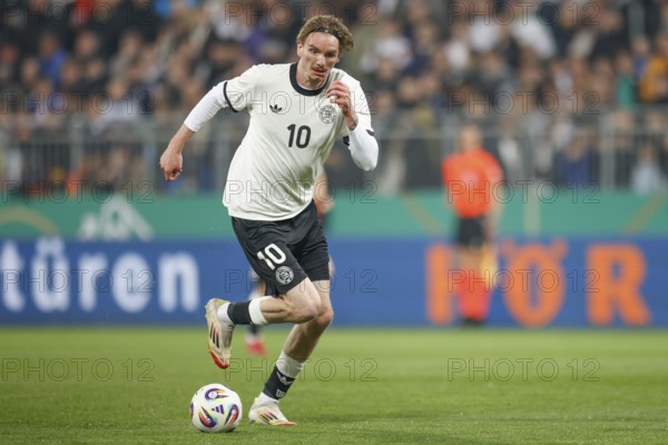 Football, U21, Friendly match, 2024/2025, Germany U21 vs. Spain U21, 25.03.2025, Merck-Stadion am Böllenfalltor, Darmstadt, Germany, Nick WOLTEMADE (Germany U21, 10) on the ball