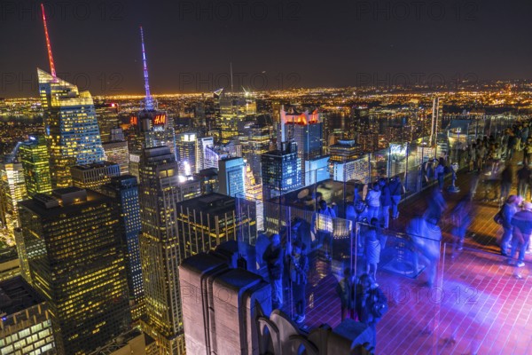 Rockefeller Center Observation Deck of the people and the night view. Shooting Location: New York, Manhattan