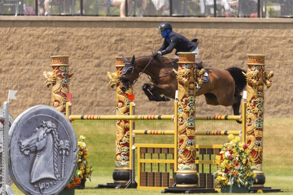 Conor Swail, from Ireland and riding Casturano, compete in the 1.60m Grand Prix during The Continental international competition at Spruce Meadows, in Calgary, Canada, North America