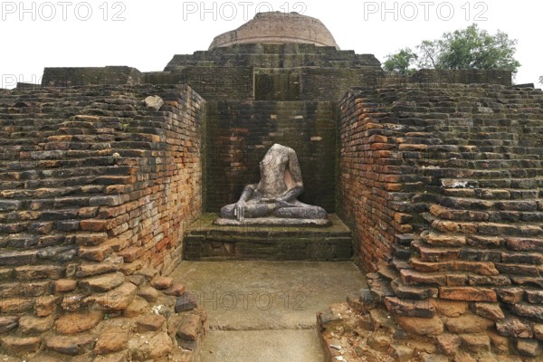 Statue of lord Buddha, Buddhist site stupa is 1400 feet-edge & 51 feet-high, Kesariya, Bihar, India