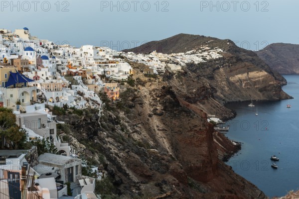 White houses on the crater rim, blue hour, Oia, Santorini, Cyclades, Greece