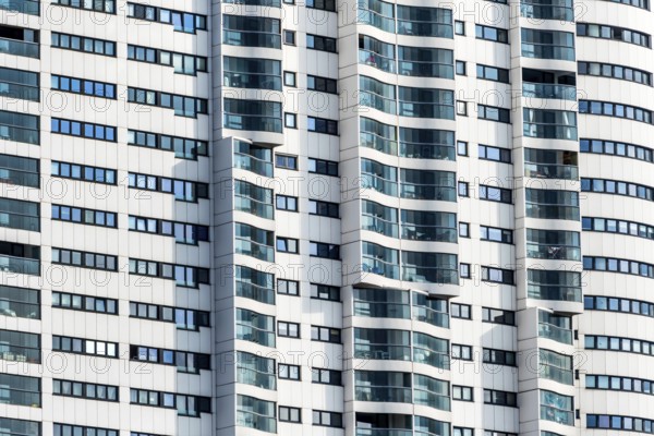A high-rise building in Vienna for flats and offices. Façade with many windows Austria