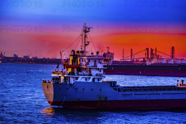 Cargo ship silhouette and sunset. Shooting Location: Yokohama-city kanagawa prefecture
