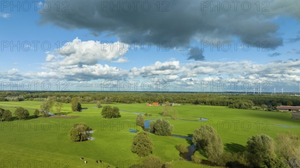 Aerial view of a beautiful green landscape with a small river flowing through. It is in the eastern part of the Netherlands