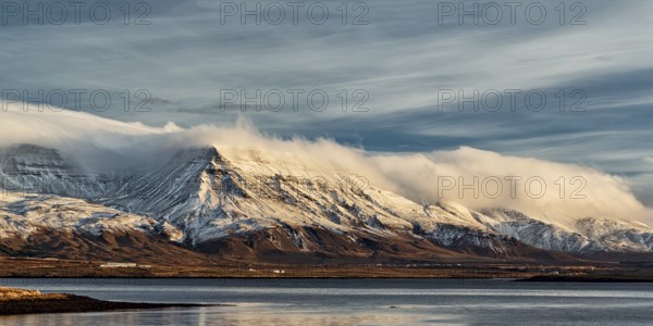 Sunrise in the mountains seen from Reykjavik, Iceland
