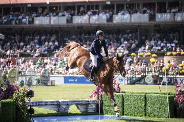 Juan Manuel Gallego of Columbia and riding Fee Des Sequoias Z compete in the first round of the 1.60m CPKC International during the Spruce Meadows Masters, presented by Rolex, in Calgary, Alberta, Canada, North America