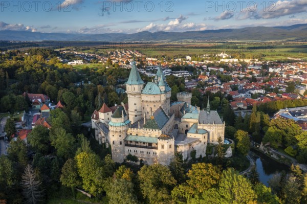 Bojnice, Slovakia, 26 September, 2022: drone view of Bojnice Castle in Slovakia in warm evening light