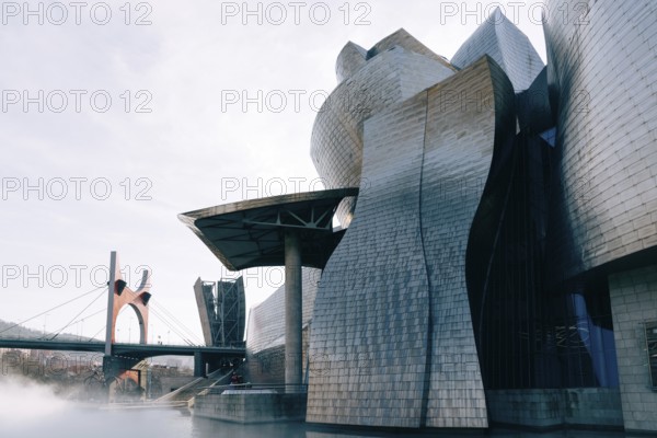 Bilbao, Spain, February 13, 2022: Exterior view of Guggenheim Museum designed built by Frank Gehry architect