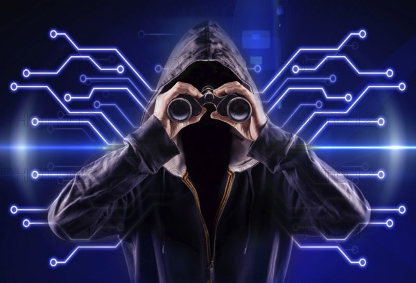 picture of a hacker with a spyglass