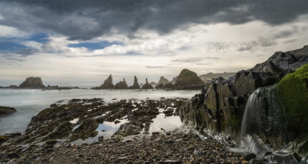 A long expiosure view of the Playa de Gueirua beach on the Costa Verde of Asturias