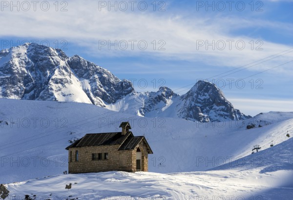 View of a Chapel in the Dolomites at the Pordoi Pass