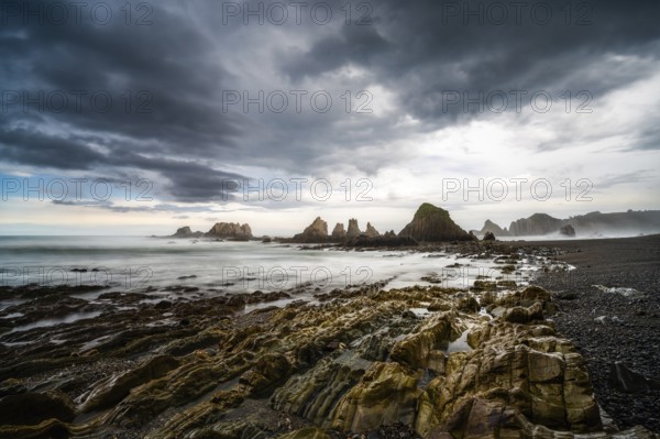 A long expiosure view of the Playa de Gueirua beach on the Costa Verde of Asturias