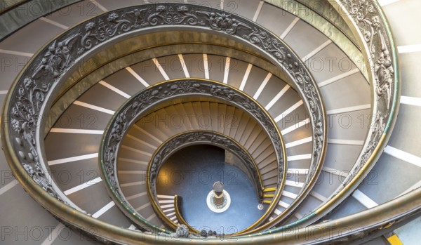 ROME, ITALY - CIRCA SEPTEMBER 2020: the famous spiral staircase with double helix. Vatican Museum, made by Giuseppe Momo in 1932