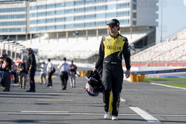 NASCAR XFINITY Driver Josh Bilicki (07) walks pit road before practice for the Drive for the Cure 250 presented by BlueCross BlieSheild of North Carolina at the Charlotte Motor Speedway in Concord NC