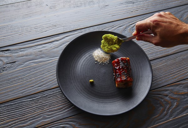 Grilled smoked eel with green apple and citrus with Sichuan Electric flower