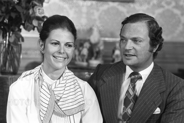 Carl XVI Gustaf and Silvia Sommerlath. Carl XVI Gustaf, King of Sweden. Born 30 april 1946. Picture taken 13 march 1976 on the day after their engagement was officially announced 12 march. The press conference is held in the princess Sibylla room at Stockholms royal castle. The couch has since the event been called the Engagement couch
