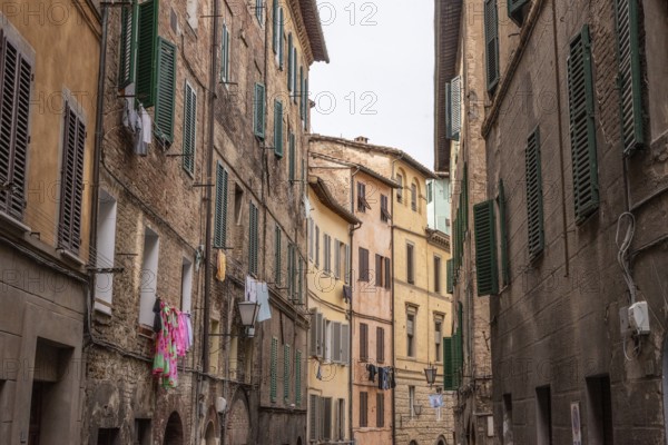Somewhere in the streets of the old medieval Siena, Italy