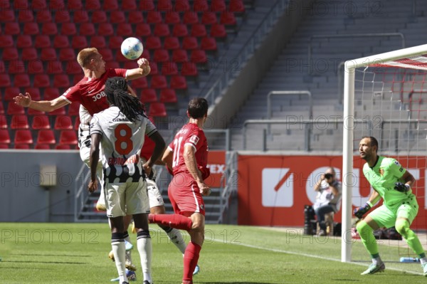 Philipp Lienhart (SC Freiburg) wins the header duel, in the background Marco Wörner (SC Freiburg) scores to make it 3:0 in the football test match: SC Freiburg - FC Basel REGULATIONS PROHIBIT ANY USE OF PHOTOGRAPHS AS IMAGE SEQUENCES AND/OR QUASI-VIDEOn Photo: Joachim Hahne/johapress, Freiburg, Germany / Germany