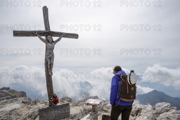 The beautiful old wooden summit cross of Mount Lagazuoi in the Dolomite Alps, autonomous province of South Tirol in Italy