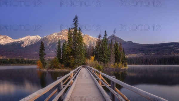 Beautiful autumn landscape scene in mountain in background in Jasper National Park west Canada with birds