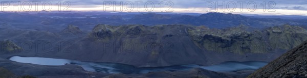Cloudy mood and evening light, view from Mount Sveinstindur, volcanic landscape, Lake Langisjór, mountains, panoramic shot, Icelandic highlands, Iceland