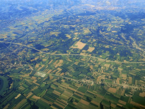 Aerial View of green fields, forest countryside