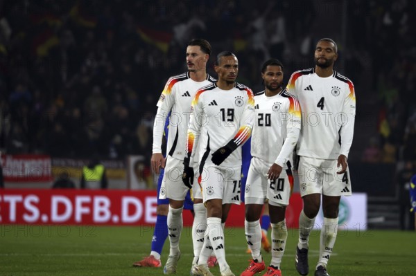 Standing together: from left. Robin Koch (Eintracht Frankfurt), Leroy Sané (Bayern Munich/Team Germany), Serge Gnabry (FC Bayern Munich) and Jonathan Tah (Bayer Leverkusen) at the UEFA Nations League match: Germany v Bosnia-Herzegovina, Freiburg, Germany / Germany