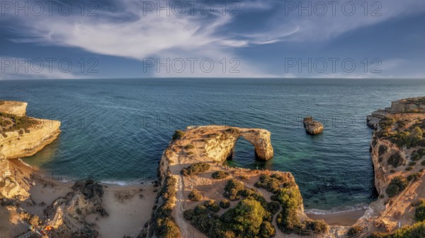 Praia de Estaquinha, Portuguese coast near the city of Lagos in the light of the setting sun
