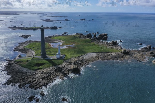 Aerial view island Ile Vierge with lighthouses Phare de l'Ile Vierge, old lighthouse from 1845 and new lighthouse from 1902, with 82, 5 metres highest lighthouse in Europe, off the coast of Plouguerneau, department Finistere Penn-ar-Bed, region Bretagne Breizh, France