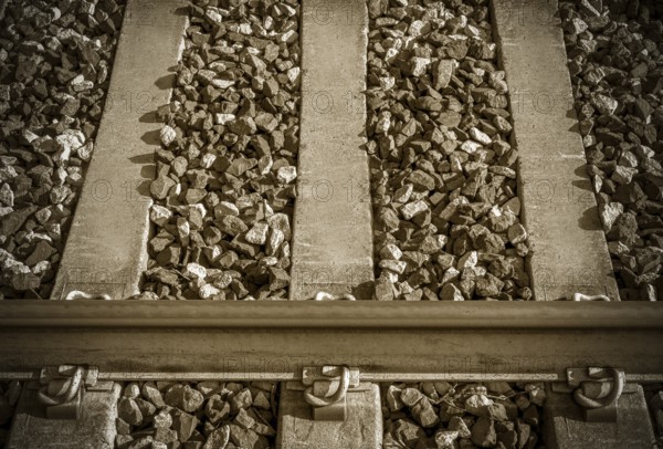 Close-up of a speedway railroad. Sepia color effect vintage style