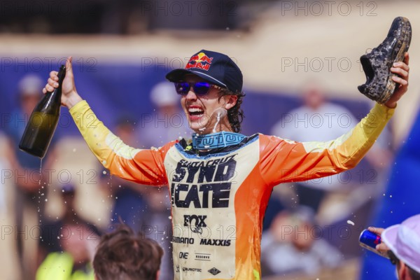MAYDENA, AUSTRALIA - FEBRUARY 08: Jackson GOLDSTONE of Canada does a Shoey after winning Red Bull Hardline Tasmania on February 8, 2025 in Maydena, Australia