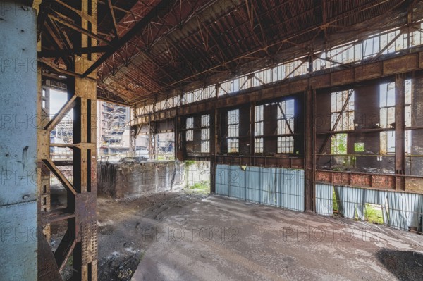 Abandoned industrial building with rusted metal structures and large, broken windows, HF6, Lost Place, Seraing, Province of Liège, Belgium