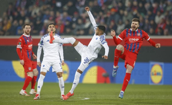 Germany: Football Conference League, Play-Offs - 1. FC Heidenheim-FC Copenhagen -Voith-Arena, Heidenheim: aerial battle between Elias ACHOURI FC Copenhagen left and Julian NIHUES 1. FC Heidenheim