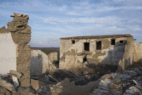 Abandoned and collapsing farm house outdoor. Clay traditional architecture ruins. Deserted places Cyprus