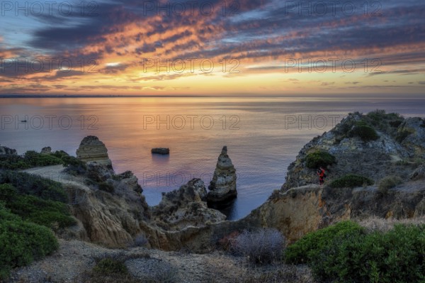 Lagos Praia da Balanca, Portuguese coast near the city of Lagos in the light of the rising sun