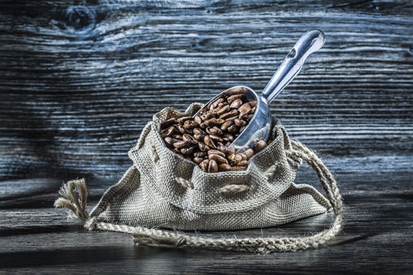 Bag with beans and shovel