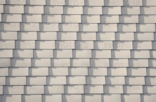 House wall with shingles