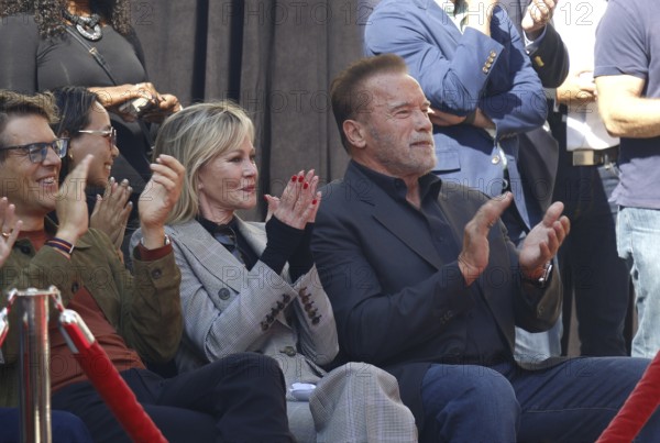 Melanie Griffith, Jason Blum, and Arnold Schwarzenegger at Jamie Lee Curtis hand and footprint in cement ceremony held at the TCL Chinese Theatre in Hollywood, USA on October 12, 2022
